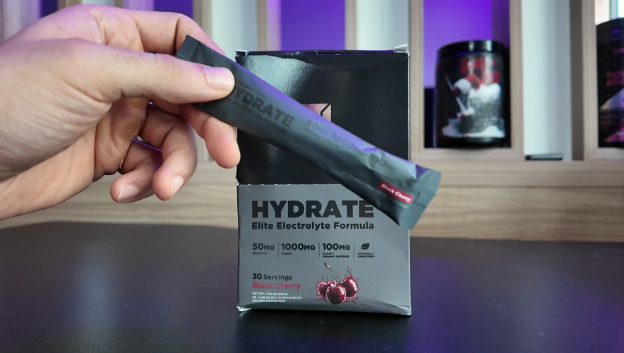 Transparent Labs Hydrate Black Black Cherry box with a single stick pack
